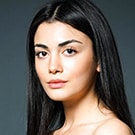 Ozge Yagiz as Reyhan Tarhun